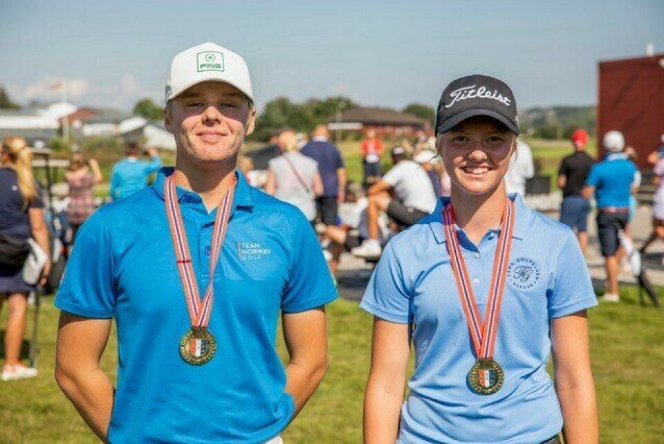 GULLMEDALJE: Rune Bøkeid med sin fortjente medalje etter NM-seieren, sammen med vinneren i jenteklassen, Silje Torvund Ohma fra Fana. GULLMEDALJE: Rune Bøkeid med sin fortjente medalje etter NM-seieren, sammen med vinneren i jenteklassen, Silje Torvund Ohma fra Fana.